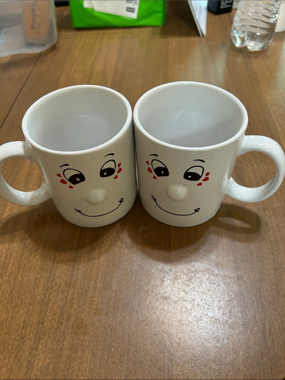 Two Cute Smiley Face w/a raised nose Ceramic Mug Set - White with Red Accents